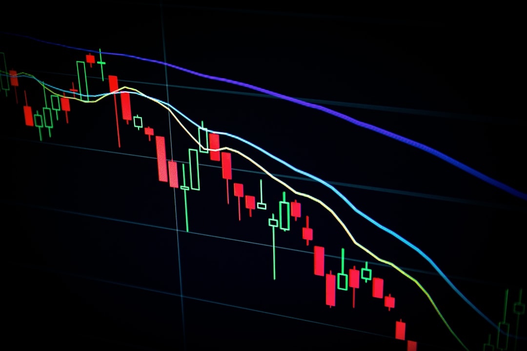 Professional trader analyzing charts while maintaining disciplined trading psychology and emotional control